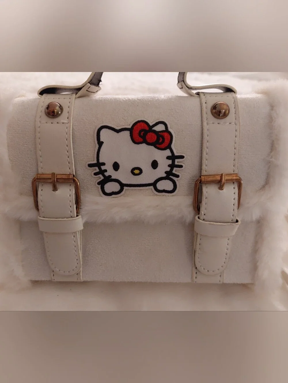 HELLO KITTY- White Faux Fur Handbag with Red Bow Accent